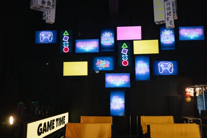 Neon lights inside a computer gaming shop, creating a futuristic digital atmosphere.