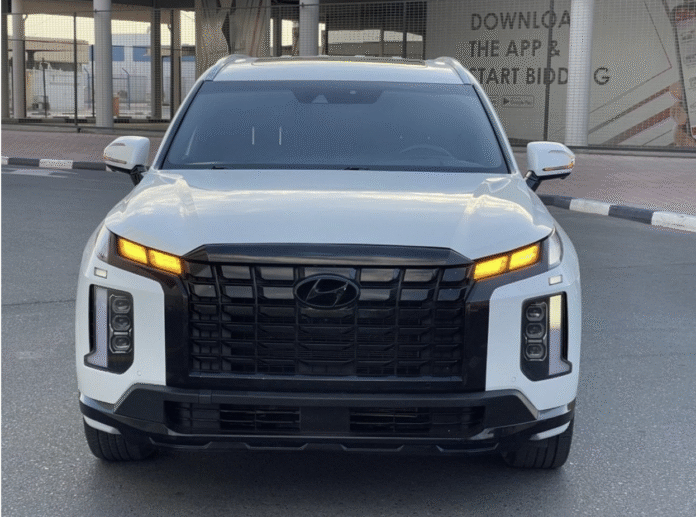Cheap used cars for sale in Dubai parked at a dealership lot