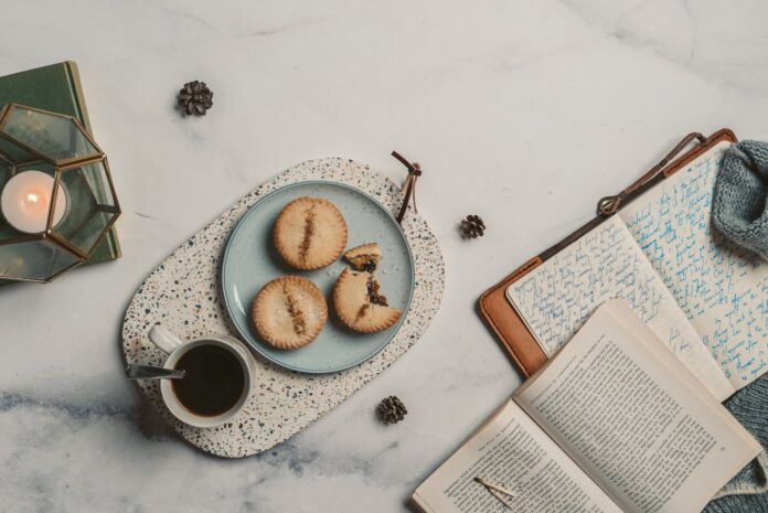 pexels-taryn-elliott-6259444 Cup of coffee with small cookies on a cozy table, symbolizing calm focus and simple daily habits that help creative people stay centered.