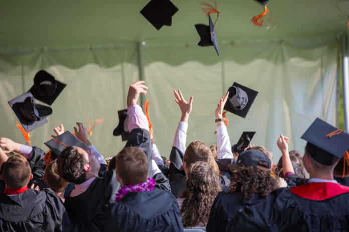 Image Source: Pexels (Students graduating)