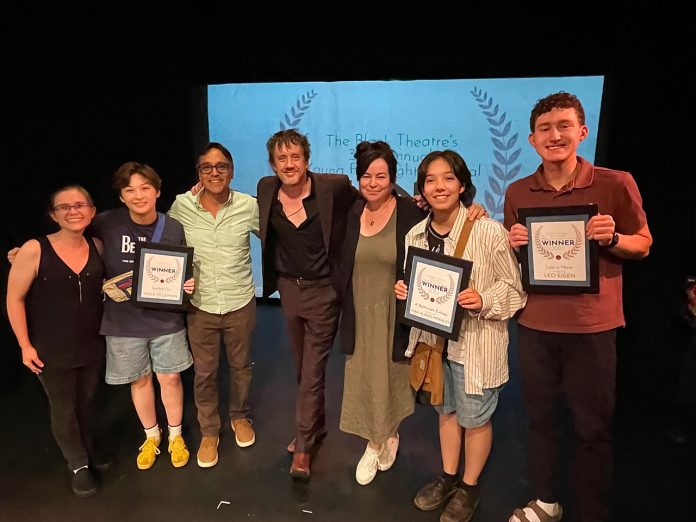 The Blank Theatre artists and participants posing with award at Young Playwrights Festival