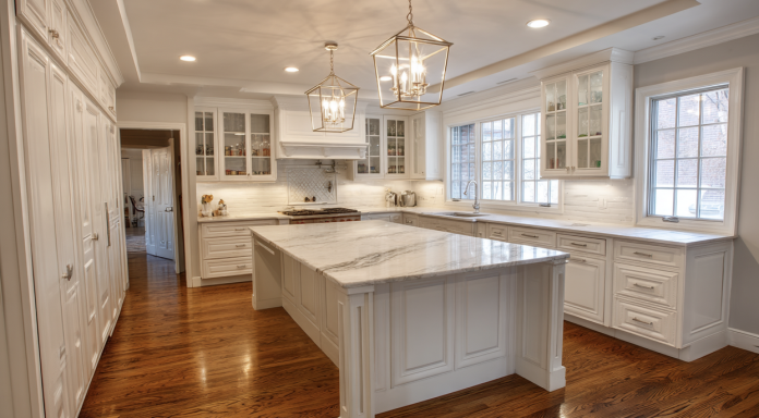 finished kitchen cabinets with detailed woodwork and island demonstrating results of building kitchen cabinets