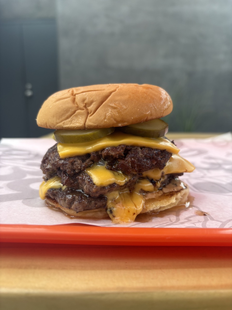 Double cheeseburger with pickles from Alley Burger in the NoHo Arts District