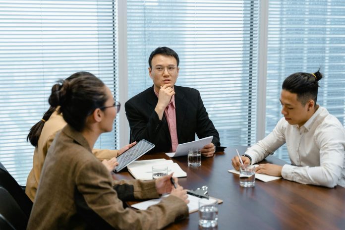 Filing a Mesothelioma Claim With a California Attorney Attorney meeting with clients about a mesothelioma claim in California.