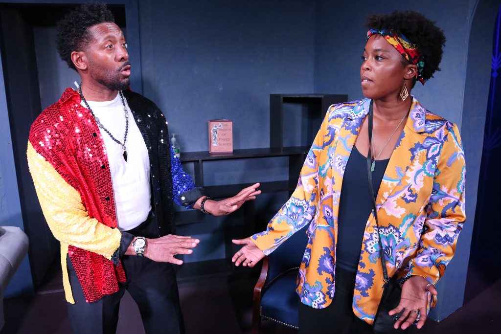 Two characters face off mid-argument in a heated scene from The Young and the Rest of Us.