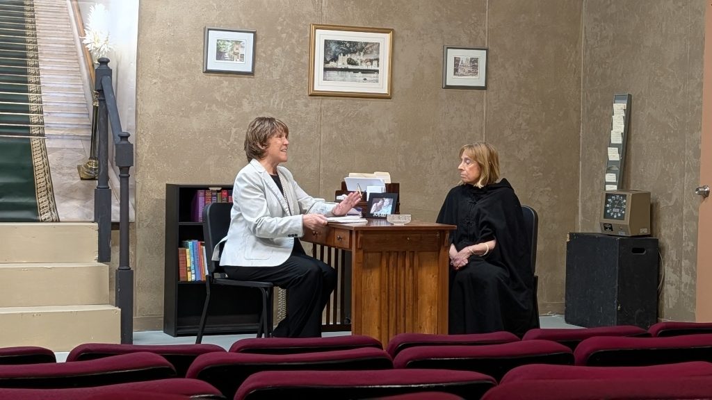 Lettice and Lovage theatre review scene with two actors  at a desk performing in ELATE production on stage in NoHo Arts District