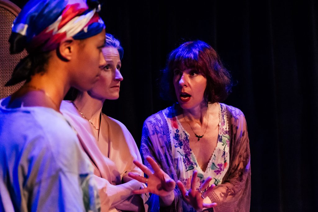 The Baptist Witches of Shelbyville featuring Angelie Simone, Mamie Gummer, and Julie Shavers in emotional stage moment