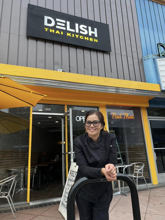 Natalee Saensradi outside Delish Thai Kitchen in North Hollywood restaurant entrance