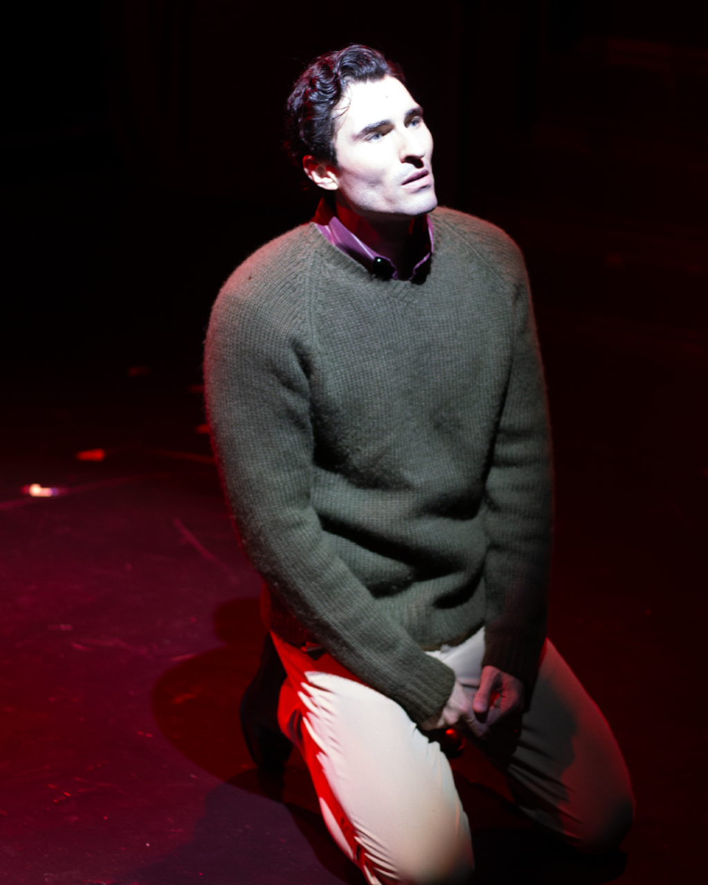 The Last Five Years stage performance at Hudson Theatre showing male lead in emotional solo moment