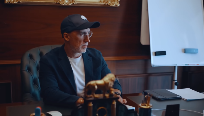 Soft2Bet executive in office setting representing iGaming business model leadership