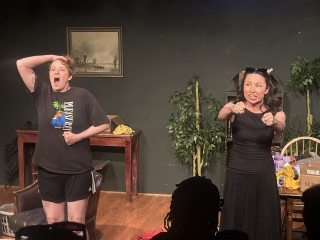 Two actors perform an exaggerated comedic scene in An Ode to Parenting theatre production