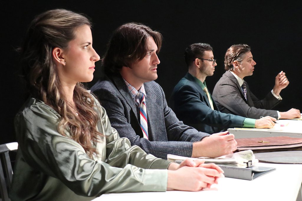 Cast members Anica Petrovic, Hudson Long, Dominic Ryan Gabriel, and Mark Stancato in courtroom scenes from A Time to Kill at the Group Rep Theatre.