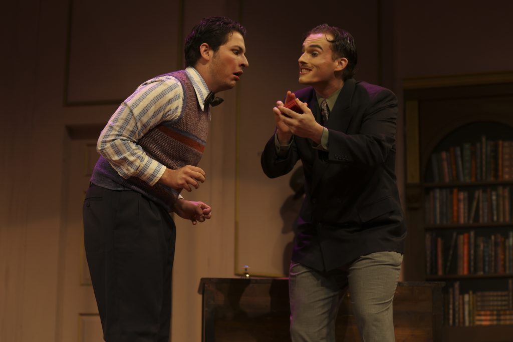 Actors perform an intense comic exchange onstage during LAPC Theatre’s production of A Flea in Her Ear