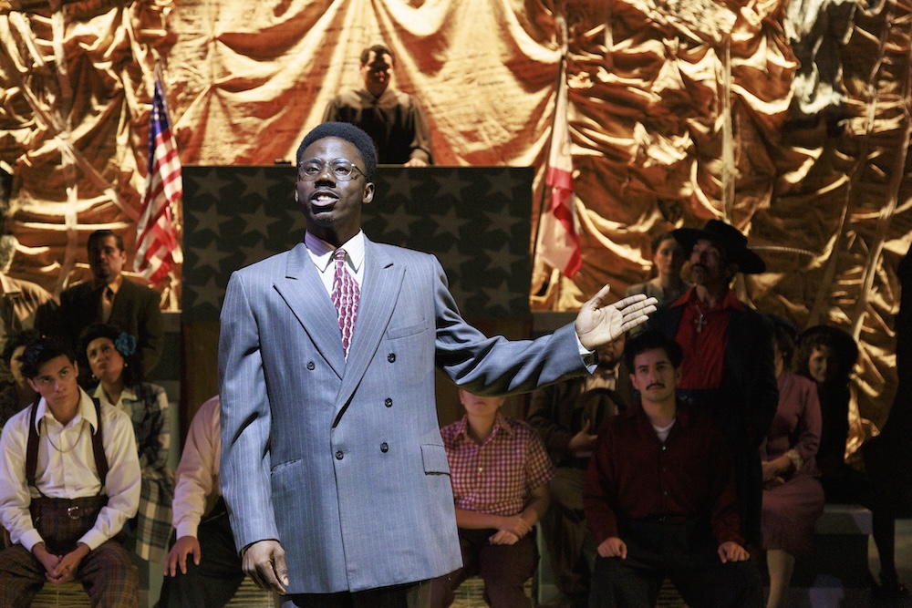 Courtroom scene from Los Angeles Mission College’s production of Zoot Suit featuring actors in period costumes during an emotional trial sequence based on the historic Zoot Suit riots.