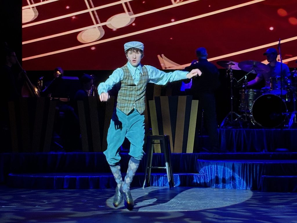 Michael Zampino performing in The Music That Makes Me Dance at El Portal Theatre with live orchestra and musical backdrop