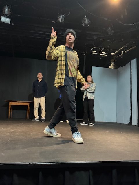 Performer rehearsing onstage during Broadway Bound musical theatre revue at Theatre West