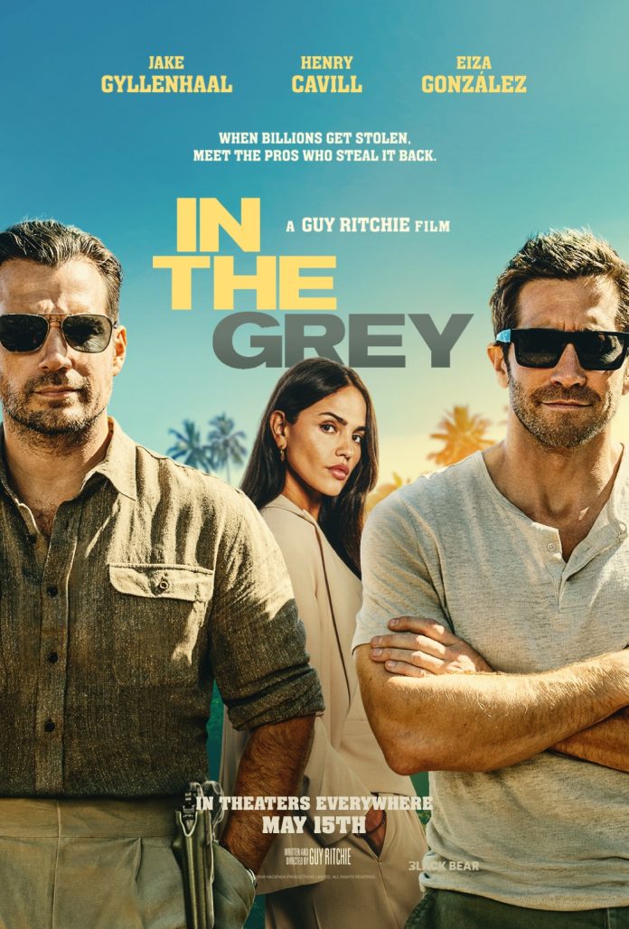 Official In the Grey movie poster featuring Henry Cavill, Jake Gyllenhaal, and Eiza González in Guy Ritchie’s action thriller about a high-stakes recovery operation.