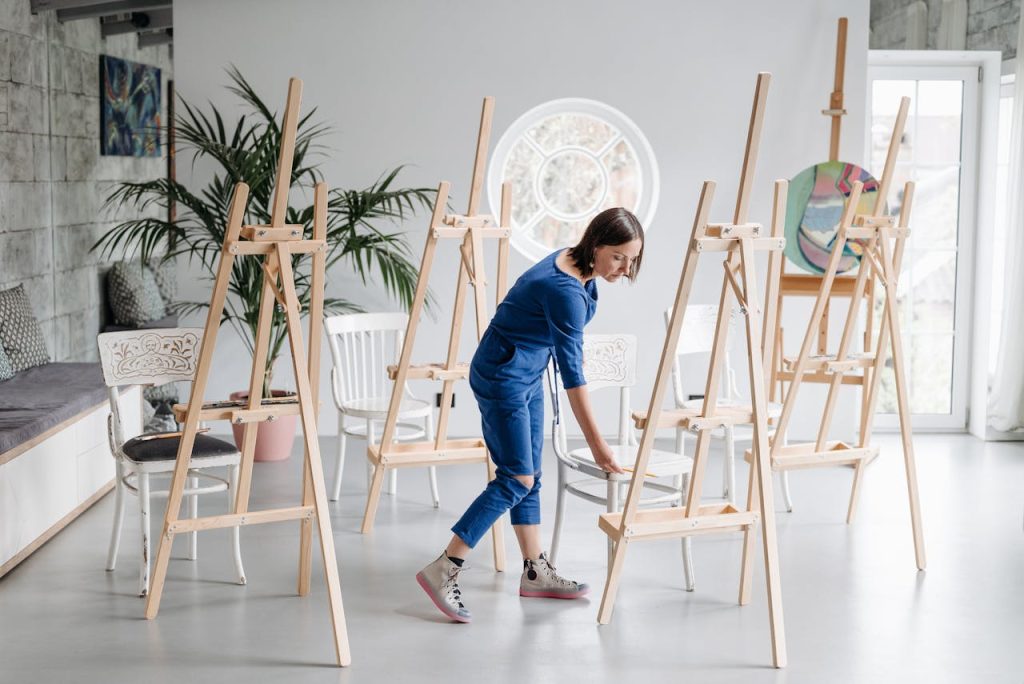 An artist studio workspace lit for adult evening creative time