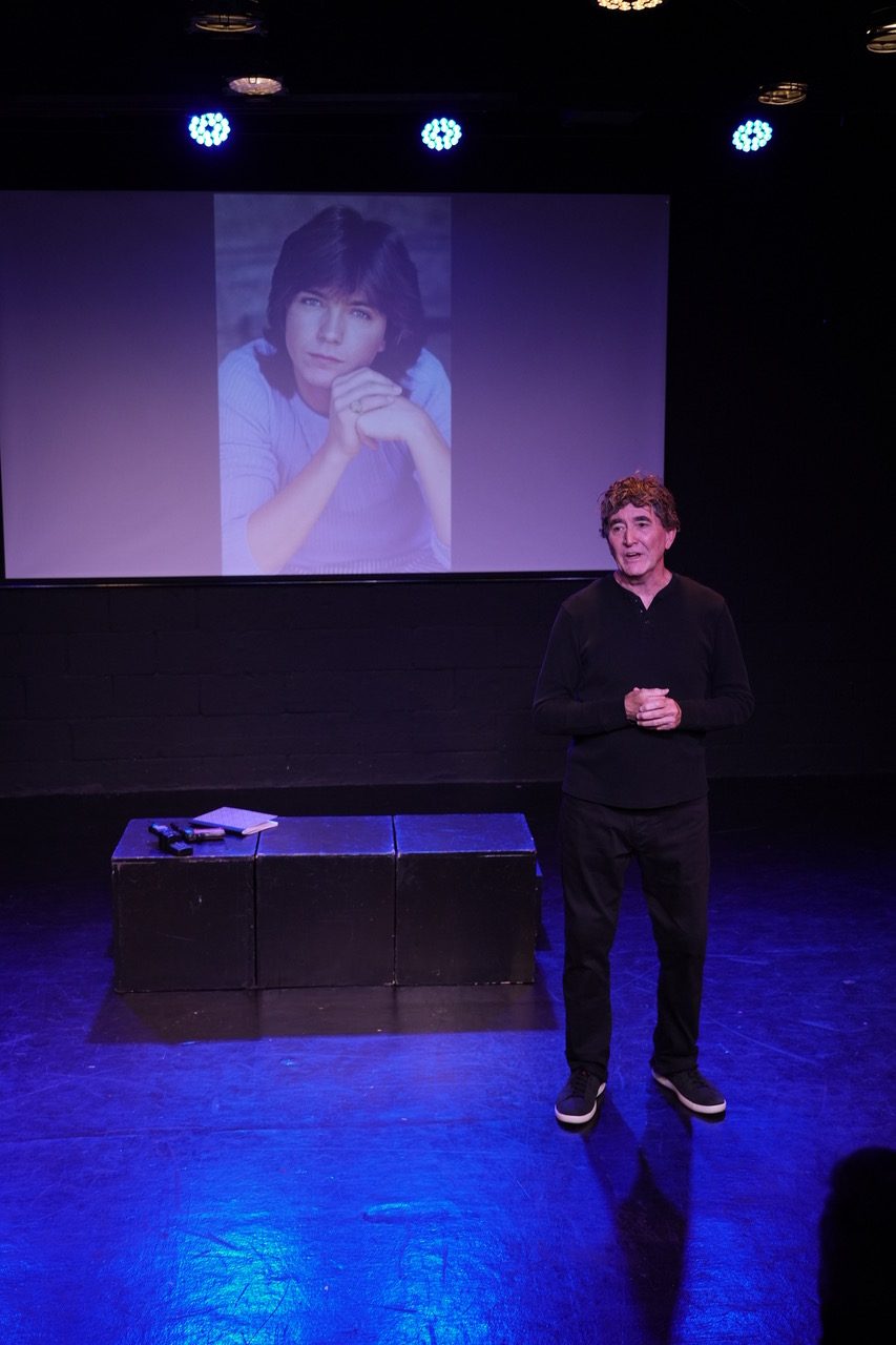 David Pavao performs Poster Child: How Charlie's Angels Kicked My Ass Out of The Closet during the 2026 Hollywood Fringe Festival review at the Zephyr Theatre.