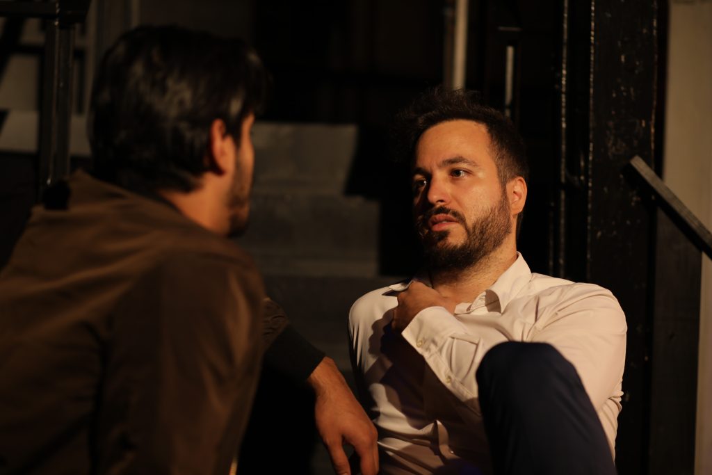 Two characters confront each other during an intense scene from Punish Me.