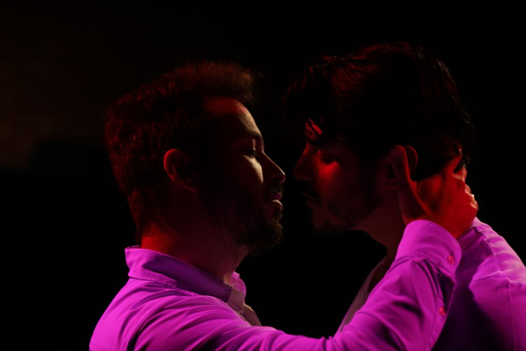 A close and intimate scene between two characters in Michael Dukakis's Punish Me.