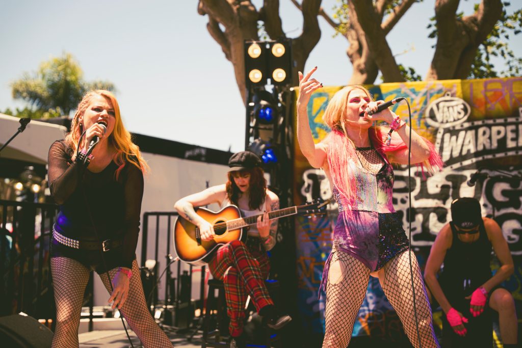 Artists perform live at the Gritty In Pink Warped Tour activation