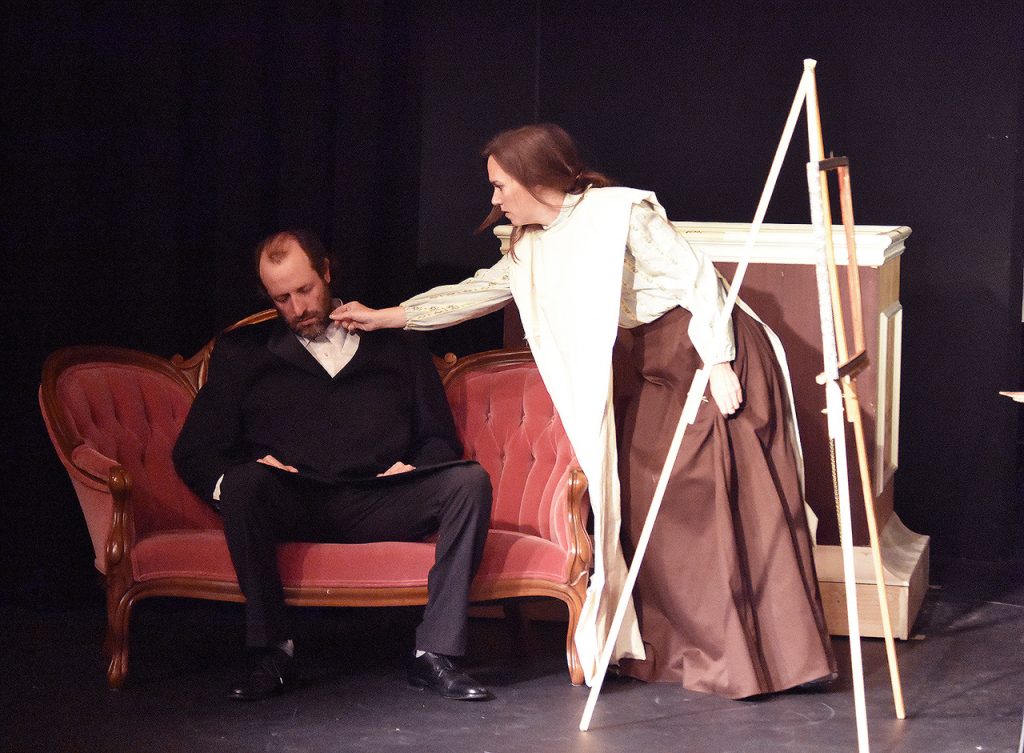 Mary Cassatt stands determined with a paintbrush in Theatre West's production of Cassatt.