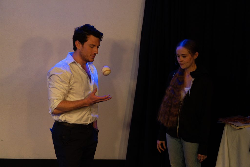 Actor performs a mysterious demonstration in A Haunting Revue II at Hollywood Fringe Festival