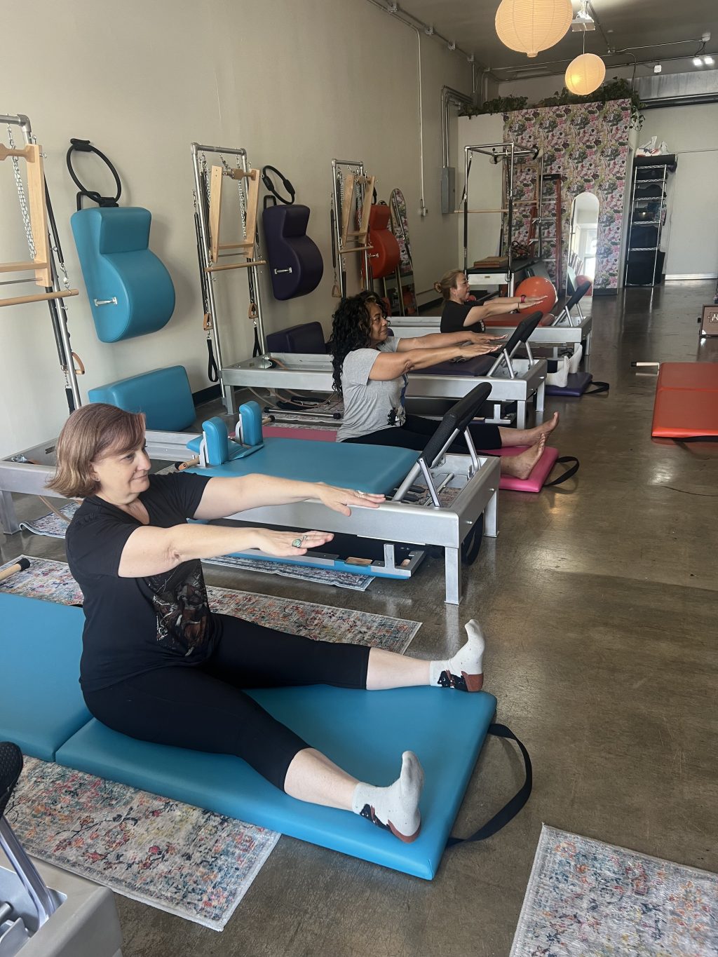 Clients participate in a small-group classical Pilates reformer class at Swan Movement Arts in North Hollywood.