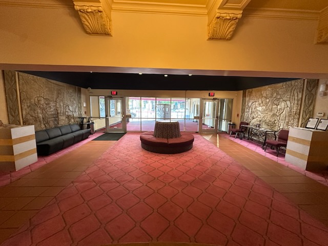 Works Progress Administration (WPA) bas-relief artwork in the El Portal Theatre lobby depicting scenes from California history.