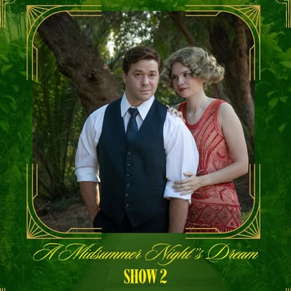 Hermia and Lysander share a quiet moment in Kingsmen Shakespeare Company's outdoor production of A Midsummer Night's Dream, set against the enchanting woodland backdrop of California Lutheran University.