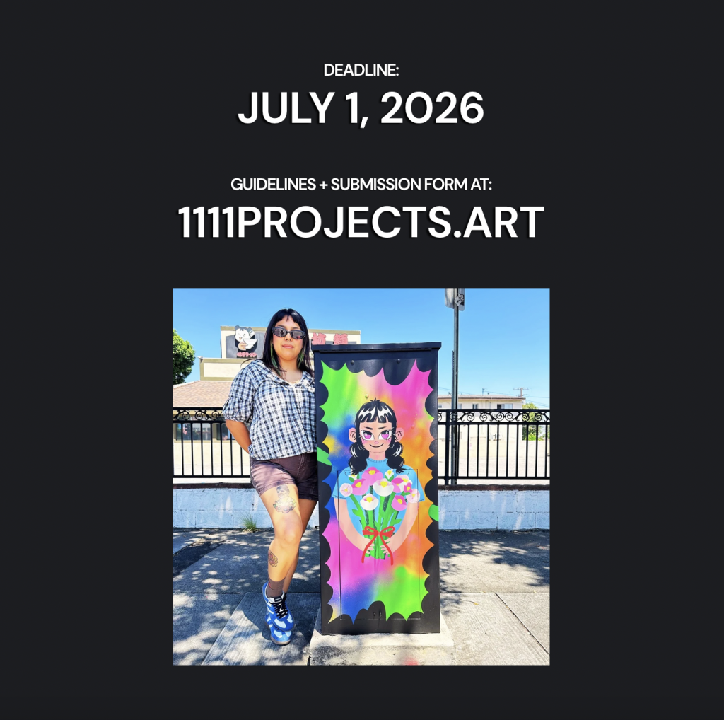 Artist poses beside a colorful painted utility box created for the Streetbox Art Project in the San Fernando Valley.
