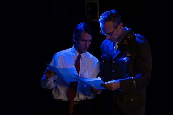 TerrenceAndBarnes Characters examine evidence during a sci-fi mystery in A Haunting Revue II