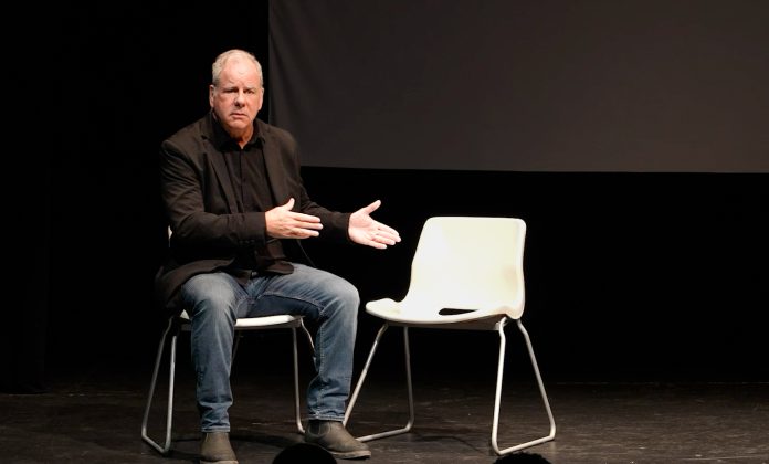 Brian Leonard performs an emotional moment in Therapist Zero, the acclaimed solo memoir at the 2026 Hollywood Fringe Festival.