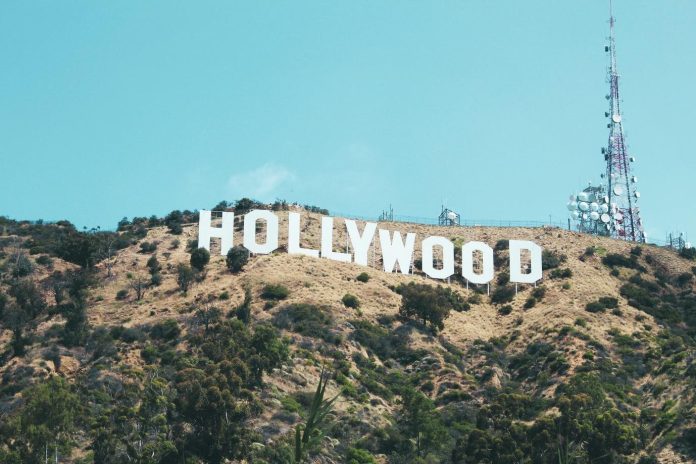 image Hollywood Sign overlooking Los Angeles hills, one of the most popular attractions and things to do in Hollywood California.