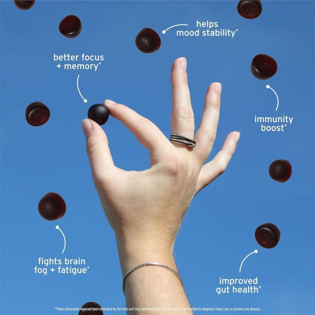 Hand holding functional supplement with claims for focus mood immunity and gut health