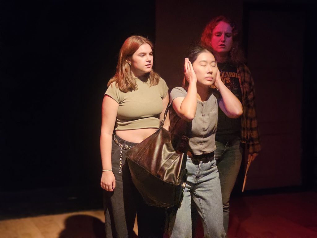 Cast members perform an intense scene from A Hot Mess in Write Act Repertory's Hot Summer Nights – The Musicals.