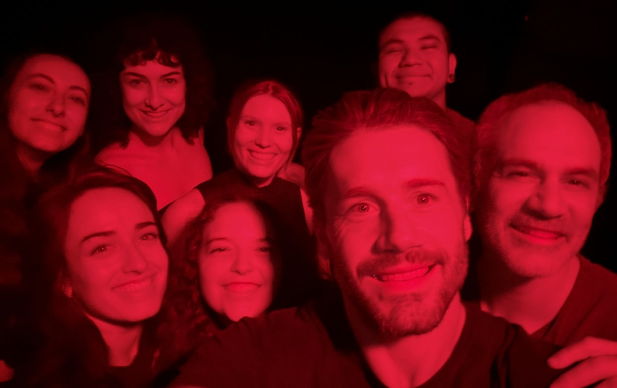 Cast of APPETITE at Zombie Joe's Underground Theatre Group gathered under dramatic red lighting for the new horror production.