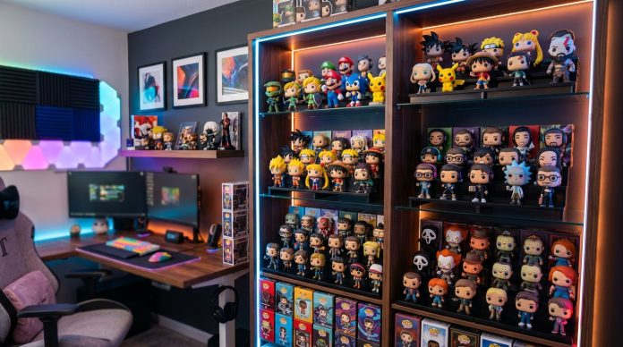 Modern collector's room with illuminated display shelves filled with vinyl figures, gaming memorabilia, and pop culture collectibles.