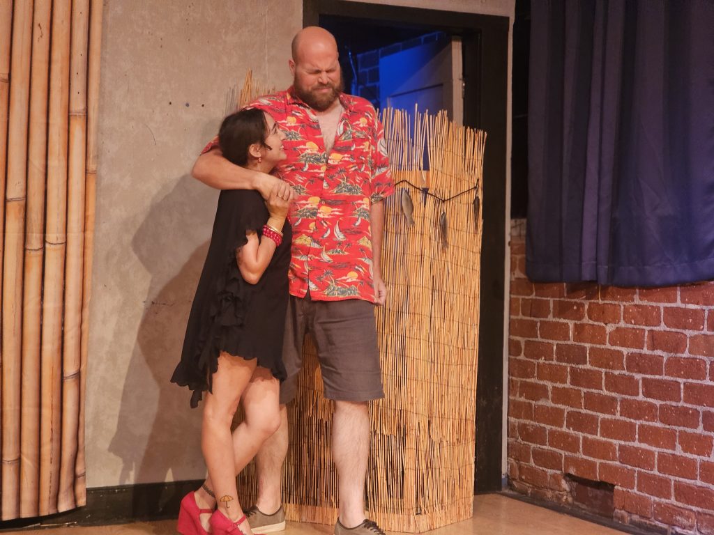 Actors perform a lighthearted scene fromTHE DISAPPEARANCE OF NORMAN CRABBE in Write Act Repertory's Hot Summer Nights – The Musicals.