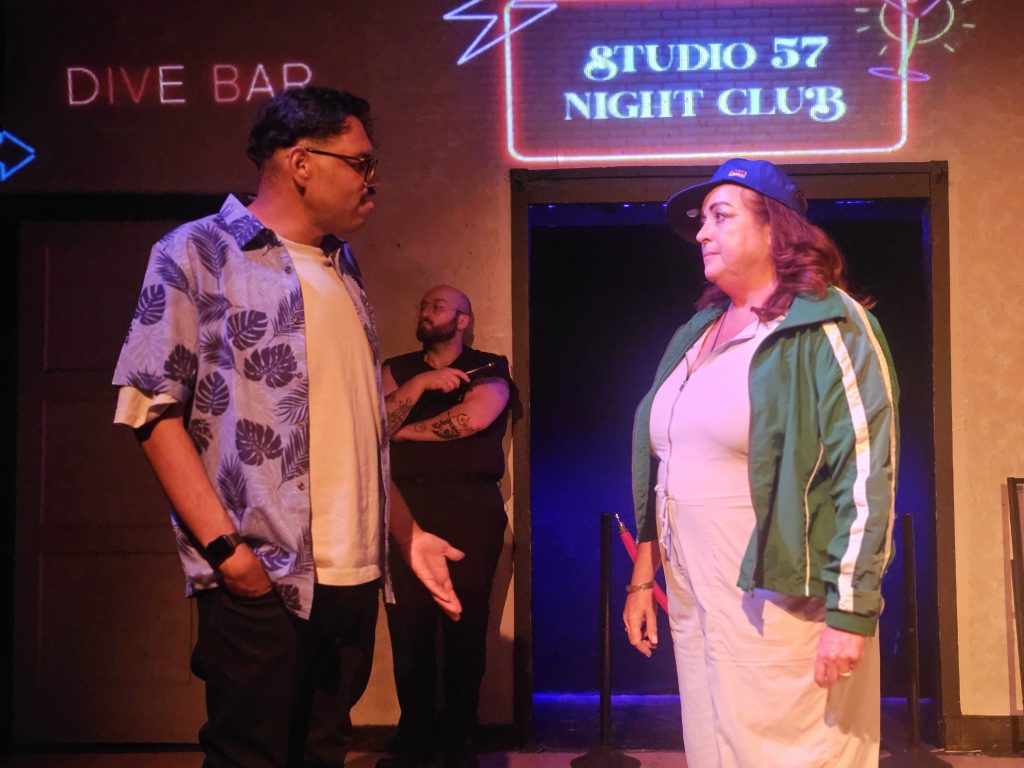 Performers in Embrace the Cringe share a comic moment during Write Act Repertory's Hot Summer Nights – The Musicals.