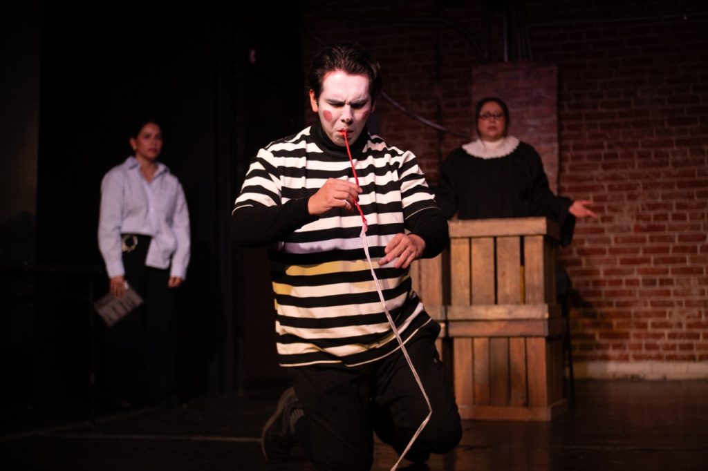 Mime clown performs as a witness during the absurd courtroom comedy Case Closed?? at the Hollywood Fringe Festival.