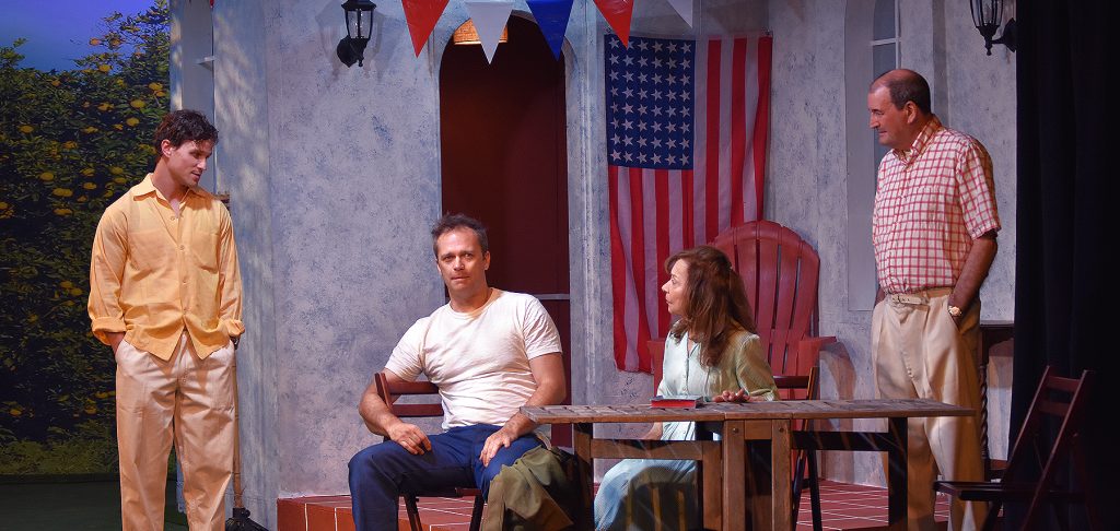 Jeanine Anderson comforts Kathie Barnes during an emotional moment in How High the Moon at Theatre West.