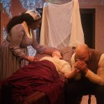 Cast members perform an emotional bedside scene in Yellow Plague from Hot Summer Nights – The Musicals by Write Act Repertory.