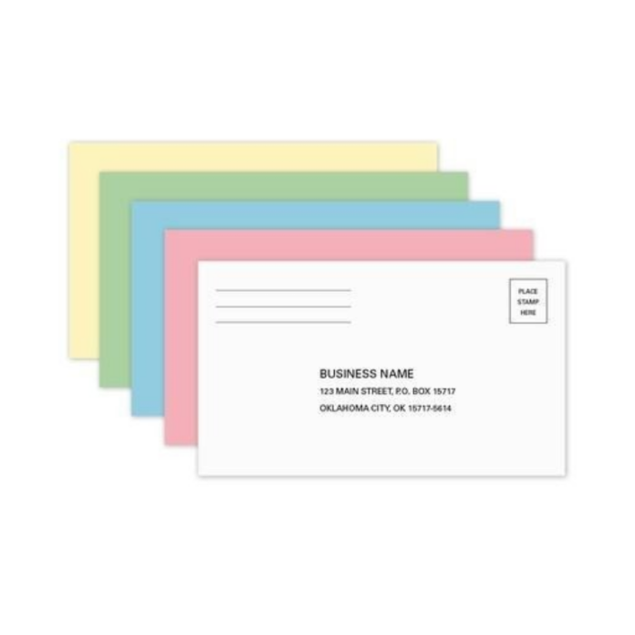 Stack of colorful mailing envelopes with a white addressed envelope in front.