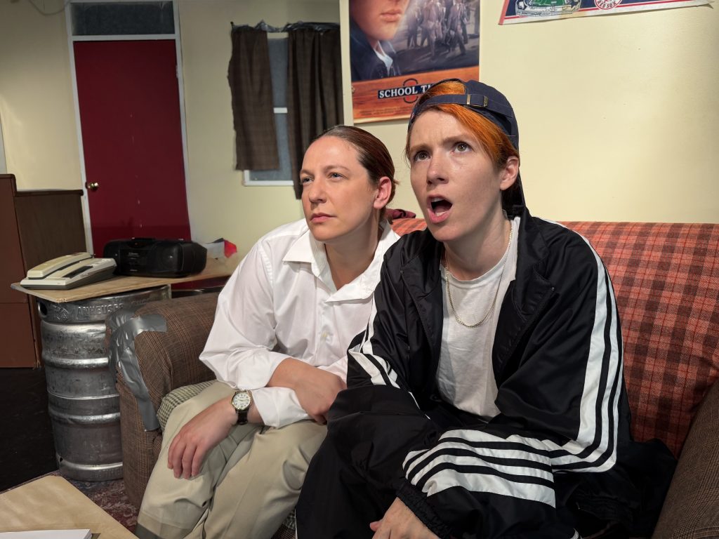 Genevieve Lerner and Spring Ferrara perform as Matt Damon and Ben Affleck in Matt & Ben, reacting to a vintage computer after the mysterious appearance of the Good Will Hunting screenplay.