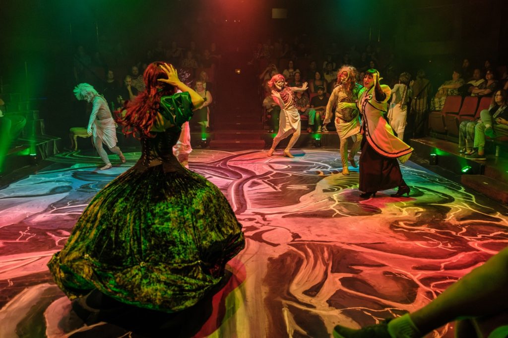 Frankenstein: Resurrection cast performing under dramatic green and red lighting at Nocturne Theatre