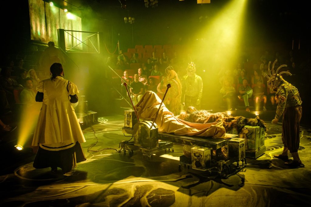 Frankenstein: Resurrection laboratory scene illuminated by dramatic yellow stage lighting at Nocturne Theatre