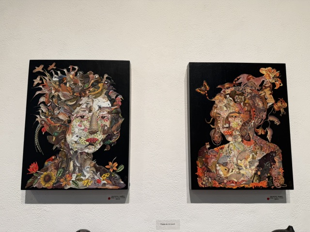 Two intricate mixed-media portrait artworks composed of animals, flowers and other natural imagery on display at Laluzapalooza 2026.