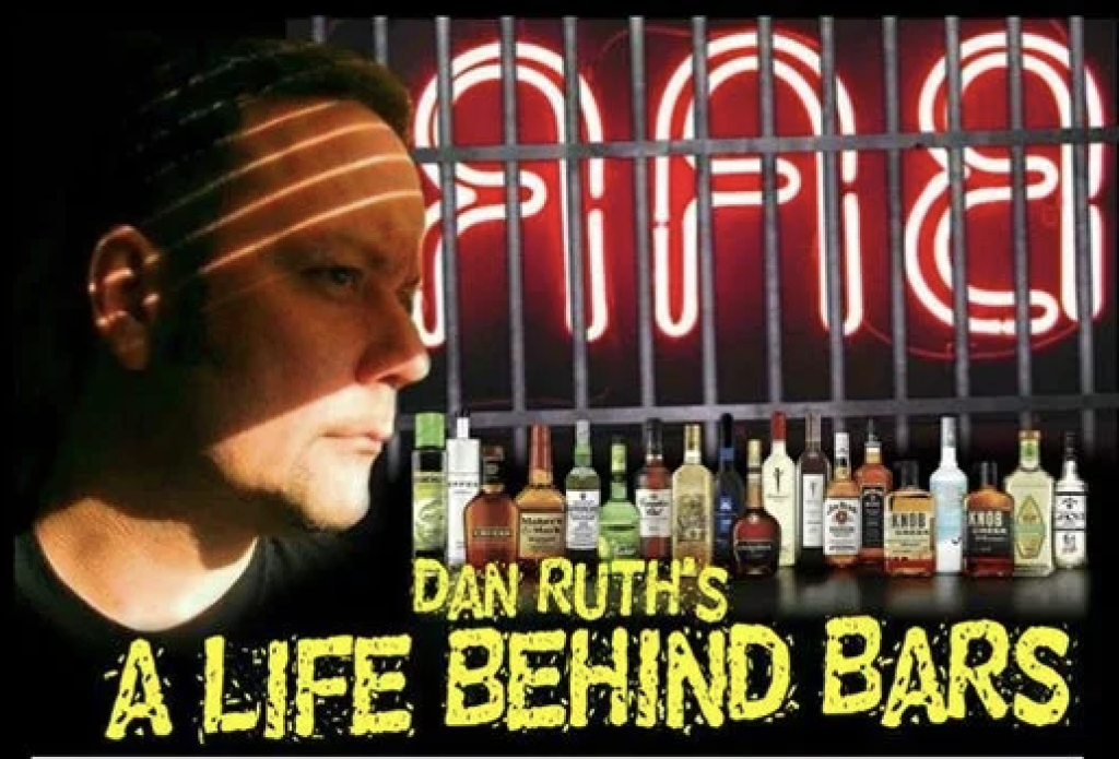 Promotional graphic for Dan Ruth’s A Life Behind Bars, featuring Ruth beside a row of liquor bottles and the show title in bold yellow lettering.